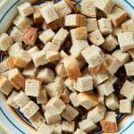 bread cubes over the cooked sausage