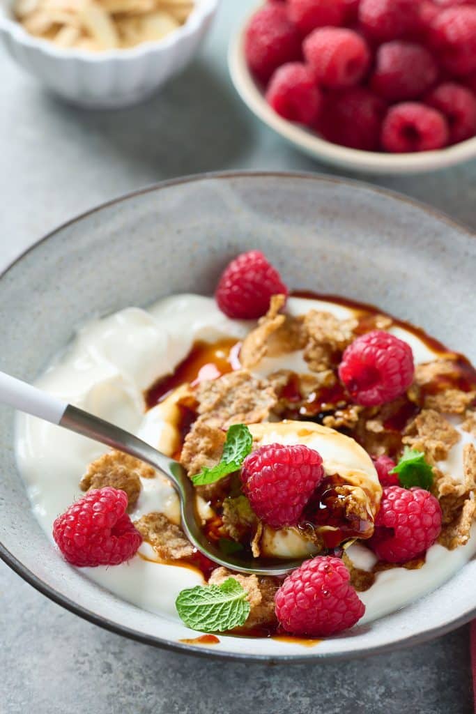  Date honey over yogurt, granola and berries.