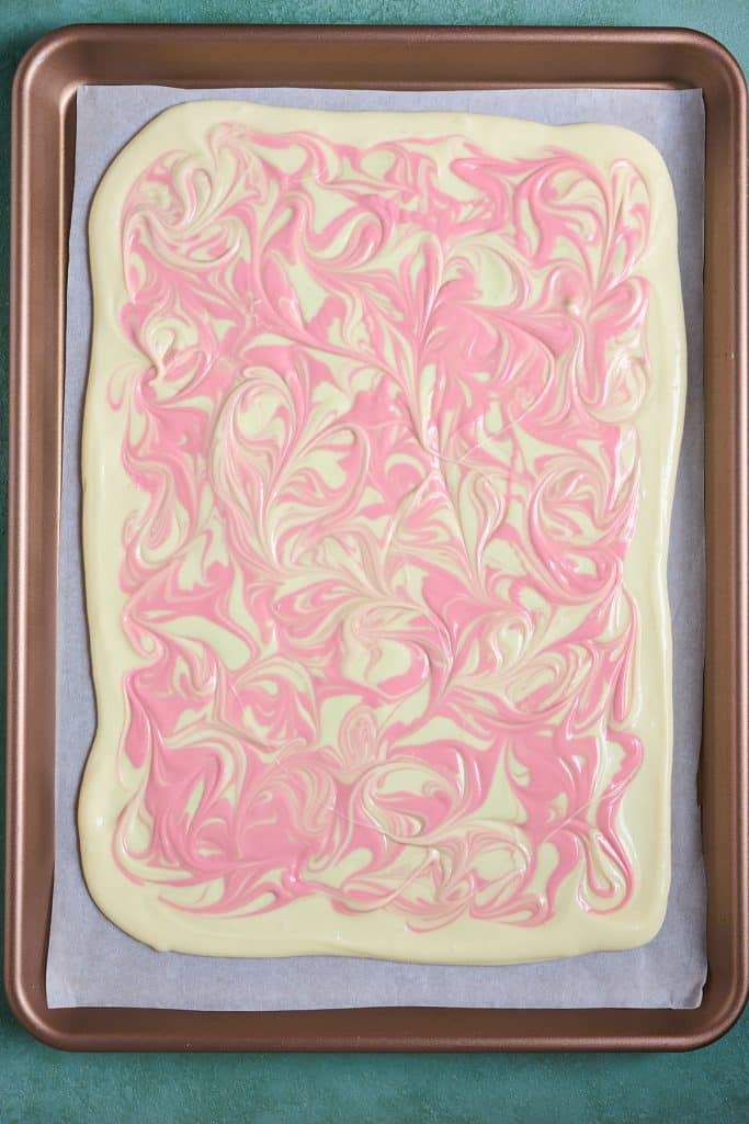 White chocolate marbled with pink melted candy