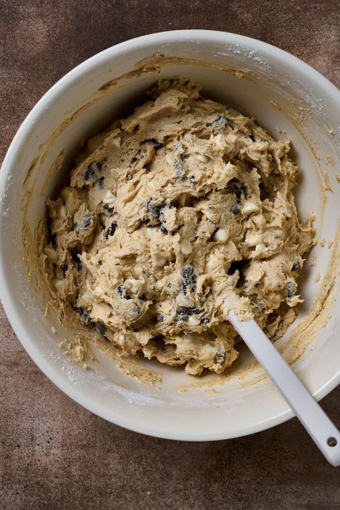 Cookies and cream cookie dough in a mixing bowl.