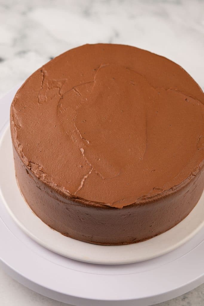 frosted vegan chocolate cake with vegan chocolate frosting