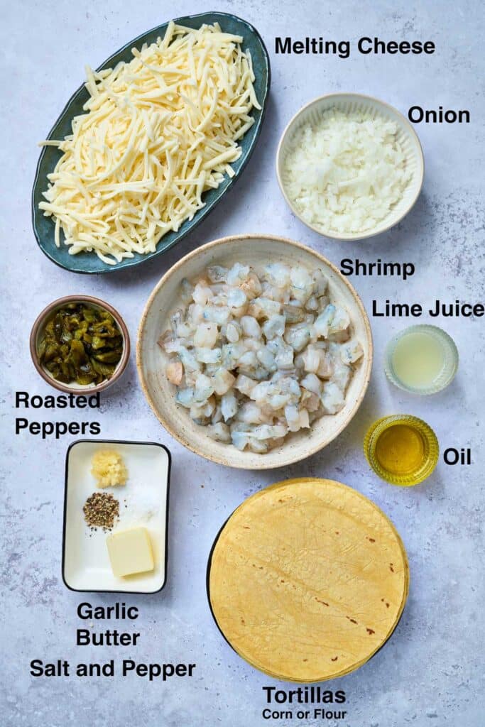 Ingredients to make cheesy shrimp tacos