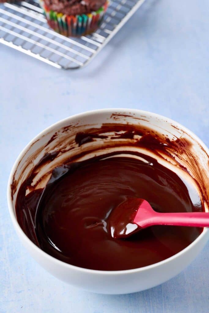 silky and glossy chocolate ganache in a bowl
