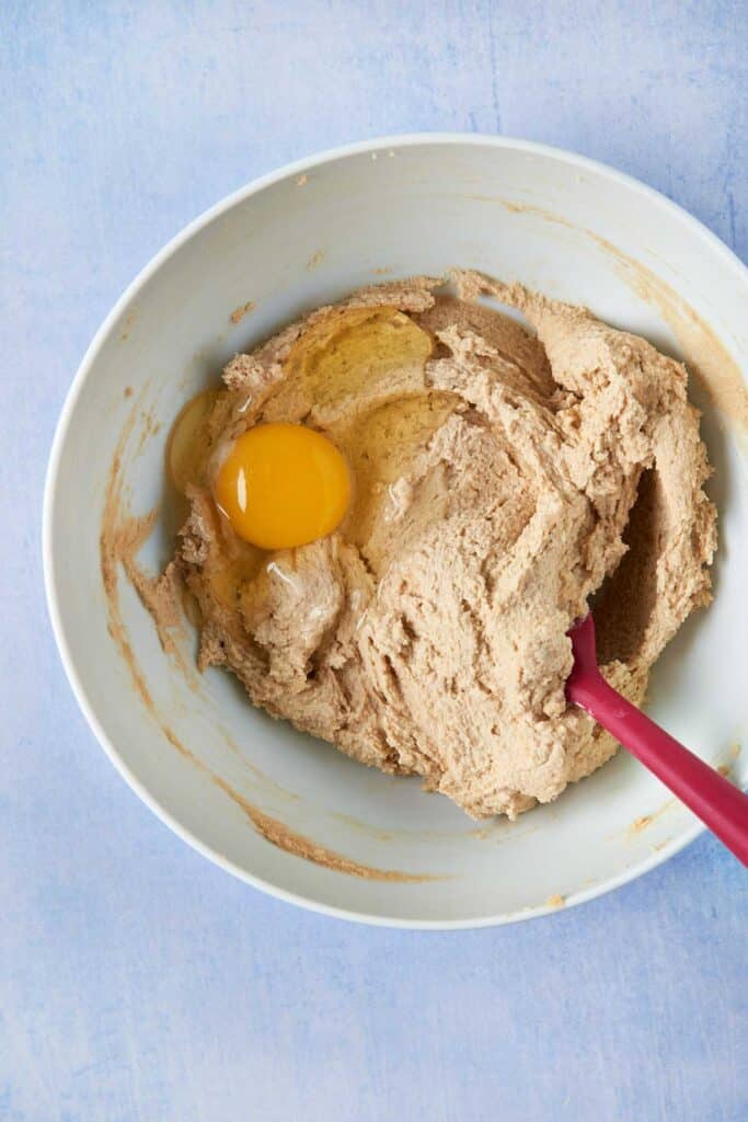 Incorporating an egg into chocolate cupcake batter