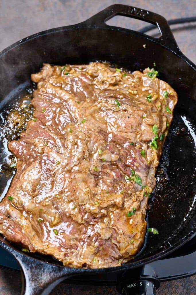 Cooking skirt steak in a cast iron skillet