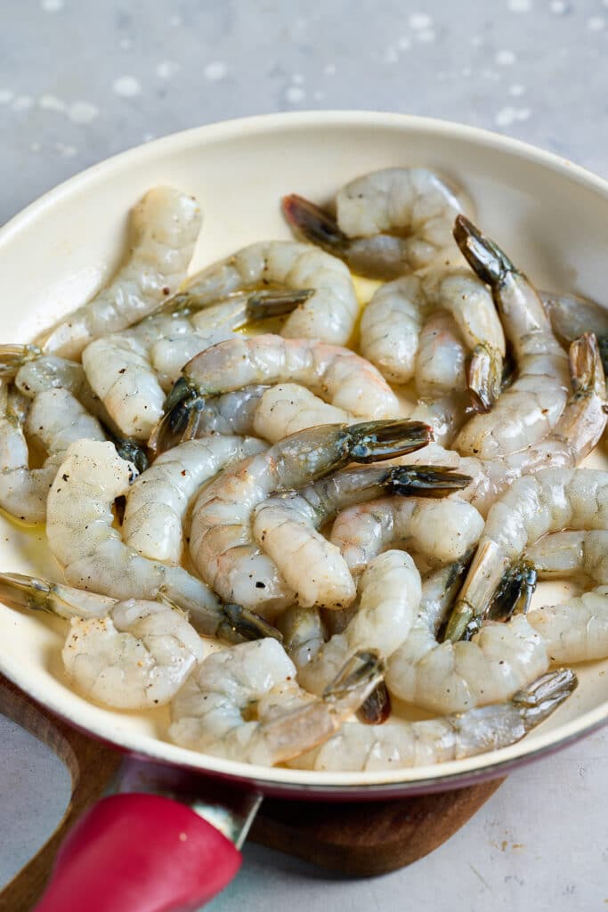 Shrimp cooking in a sauté pan