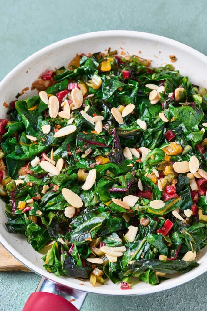 A skillet filled with sautéed swiss chard