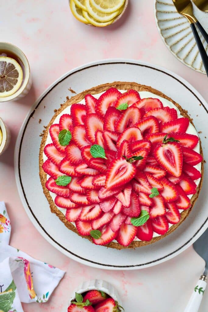 Fresh Strawberry meringue cake on a cake stand