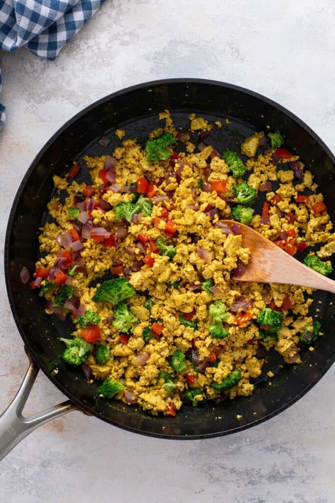 Finished tofu scramble with optional broccoli, bell pepper and onion