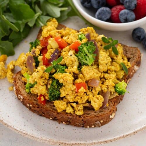 Scrambled tofu with veggies served on a toast