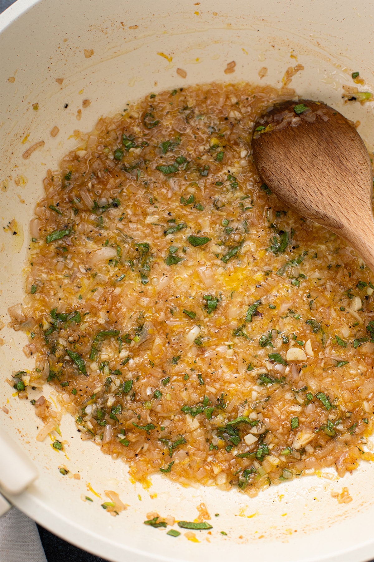Shallots, garlic, sage and lemon zest cooking in brown butter.